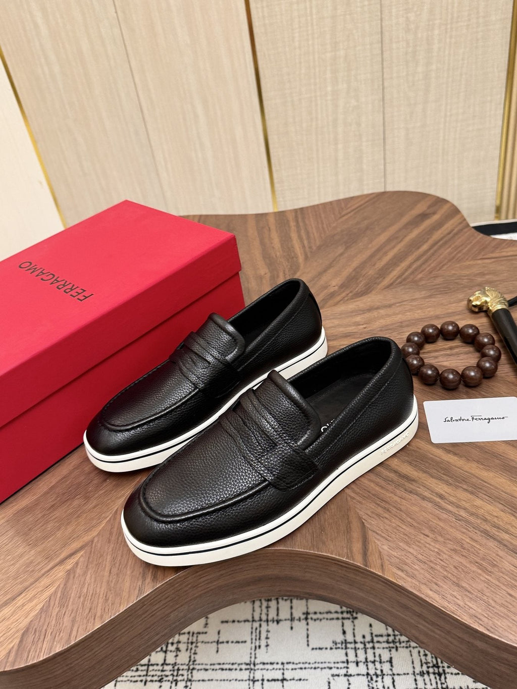 Salvatore Ferragamo Black Loafers with White Soles — front