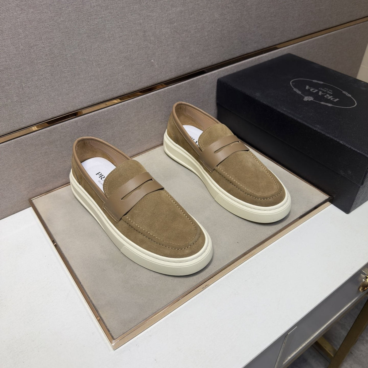 Prada Men's Penny Loafers with White Soles — front