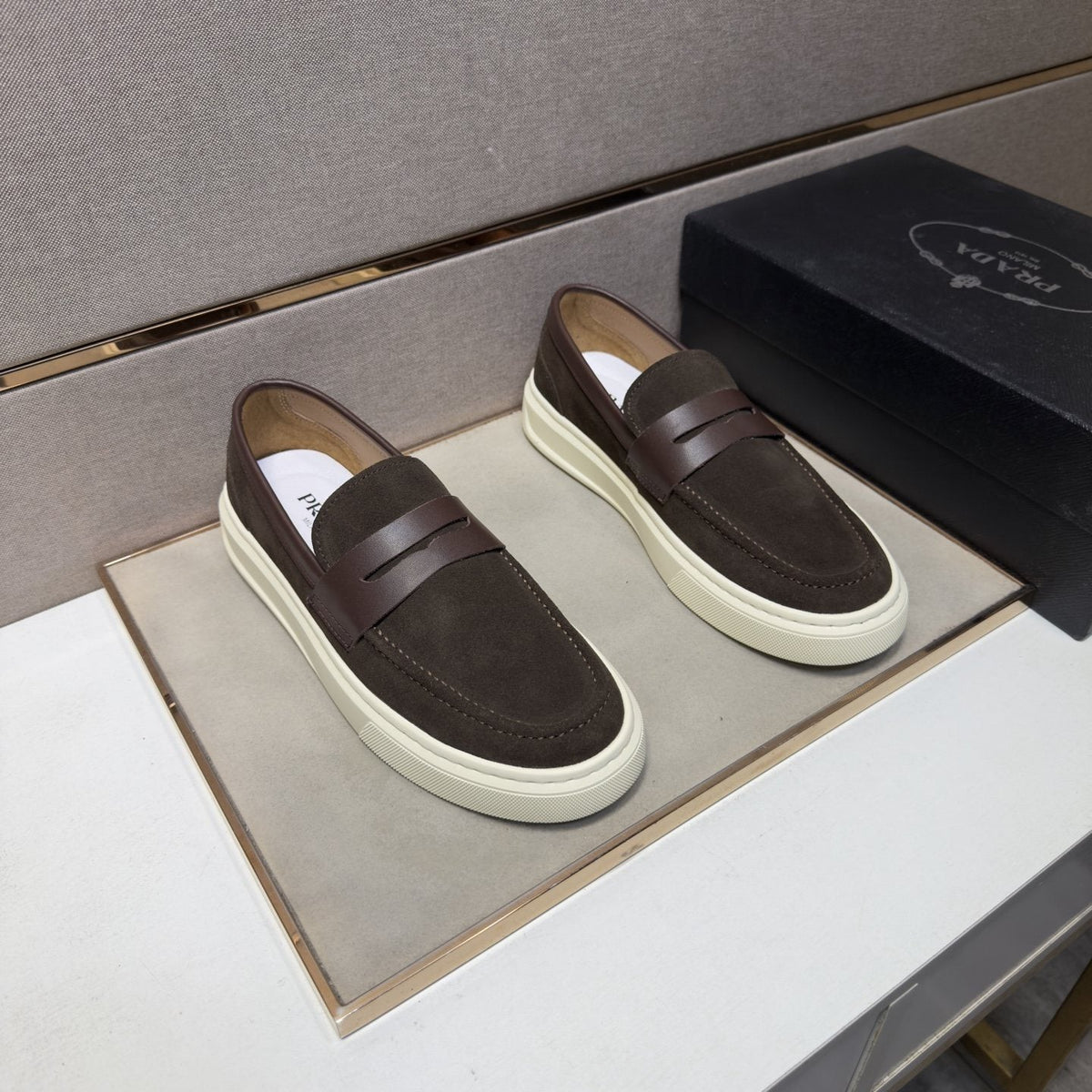Prada Men's Penny Loafers with White Soles — front
