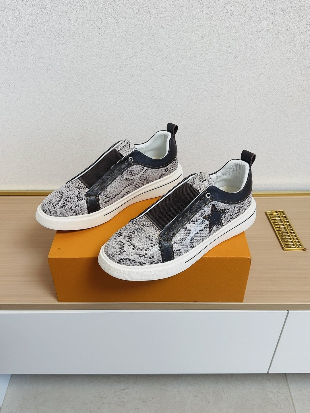 Louis Vuitton Star-Accent Low-Top Sneakers — front