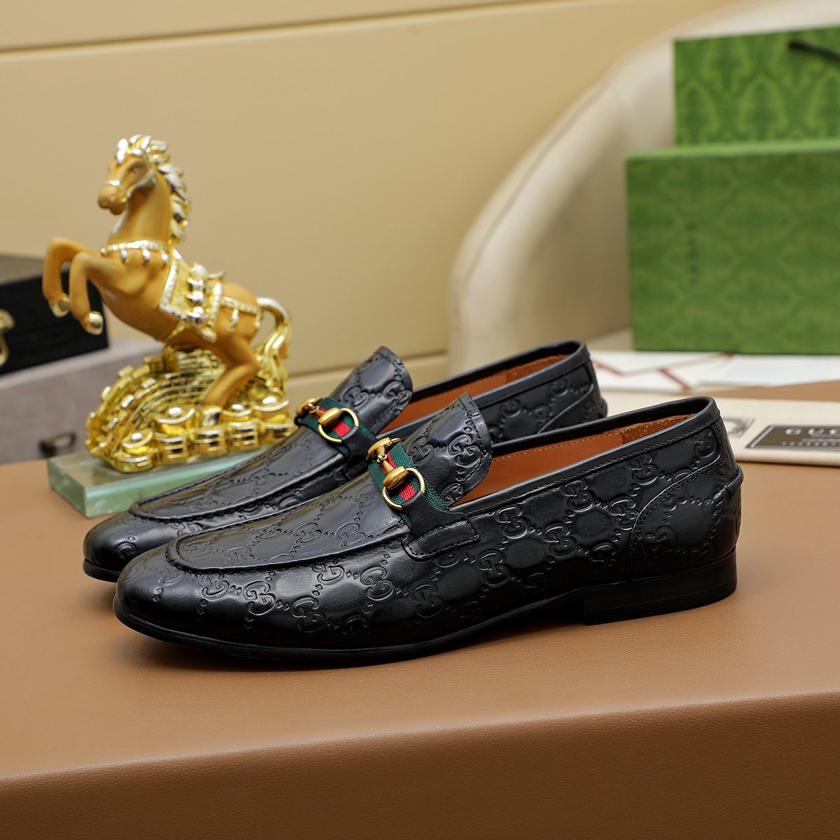 Gucci Patterned Metal-Bit Loafers — front