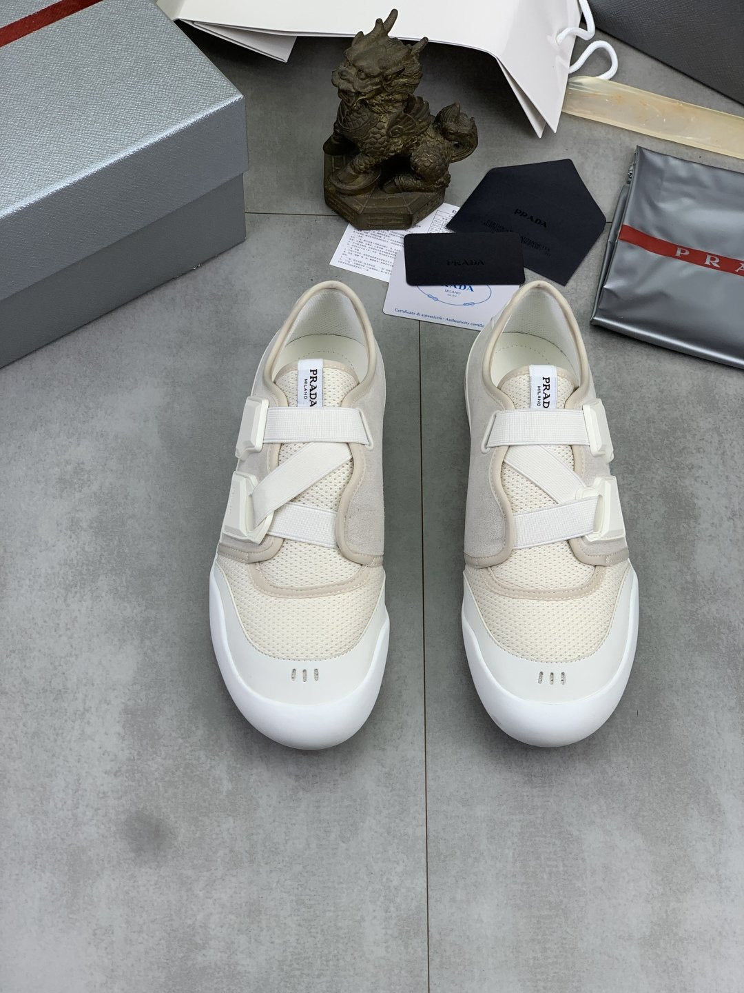 Prada Cross-Strap Low-Top Sneakers — front