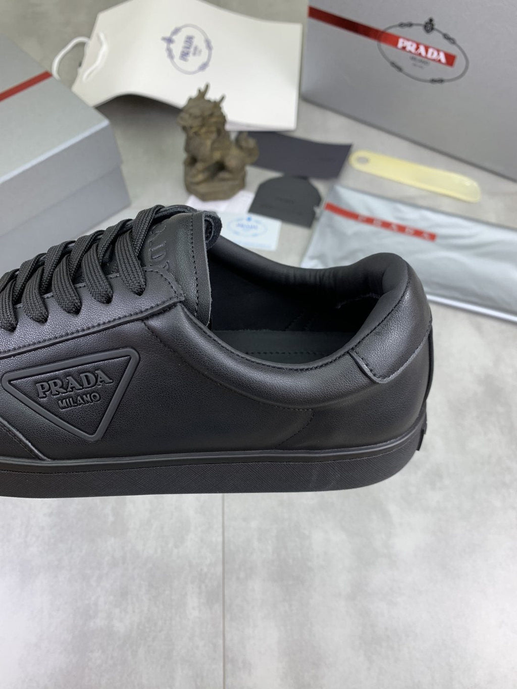 Prada Paneled Low-Top Sneakers — detail