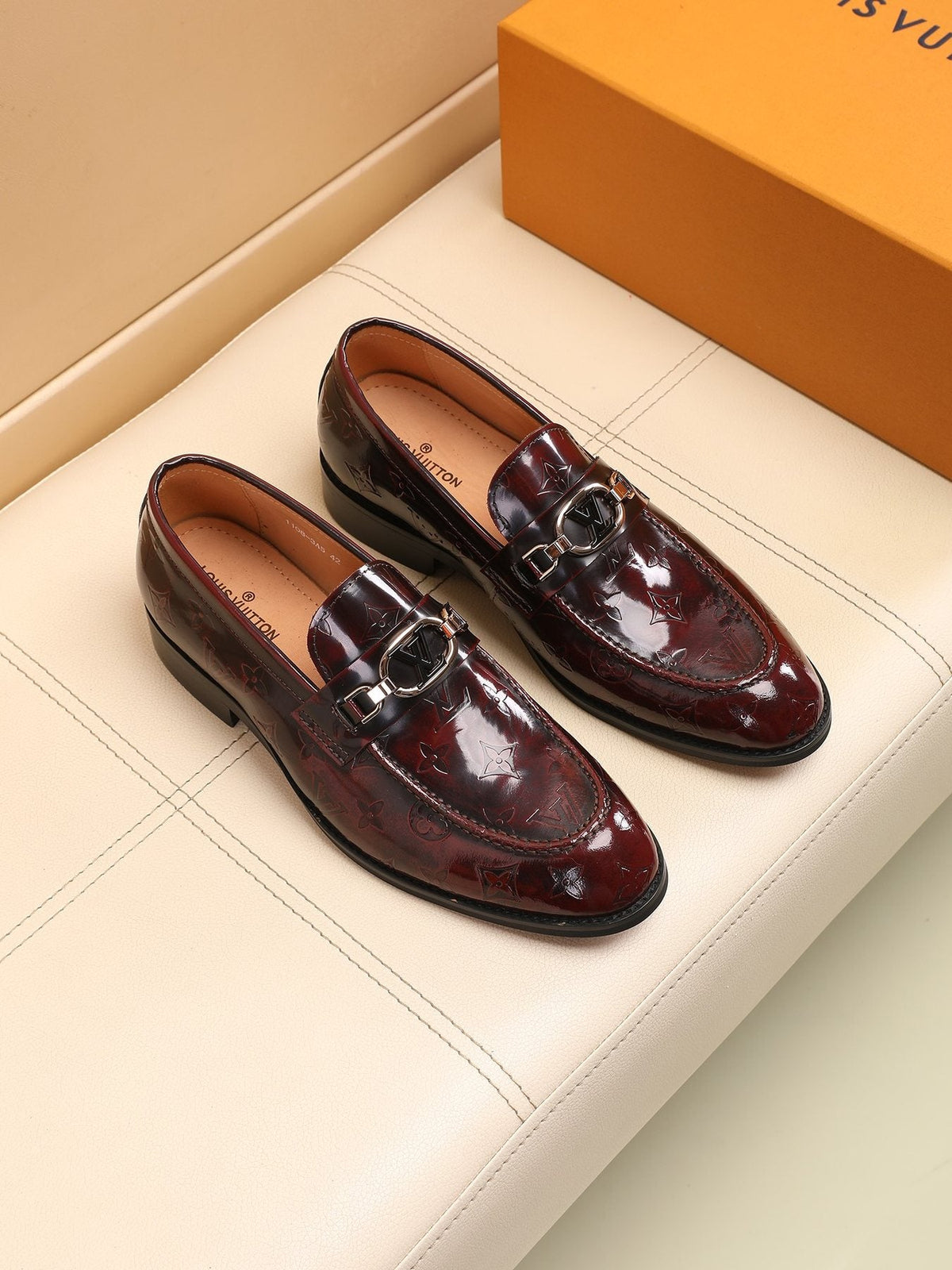 Louis Vuitton Embossed Bit Loafers — front
