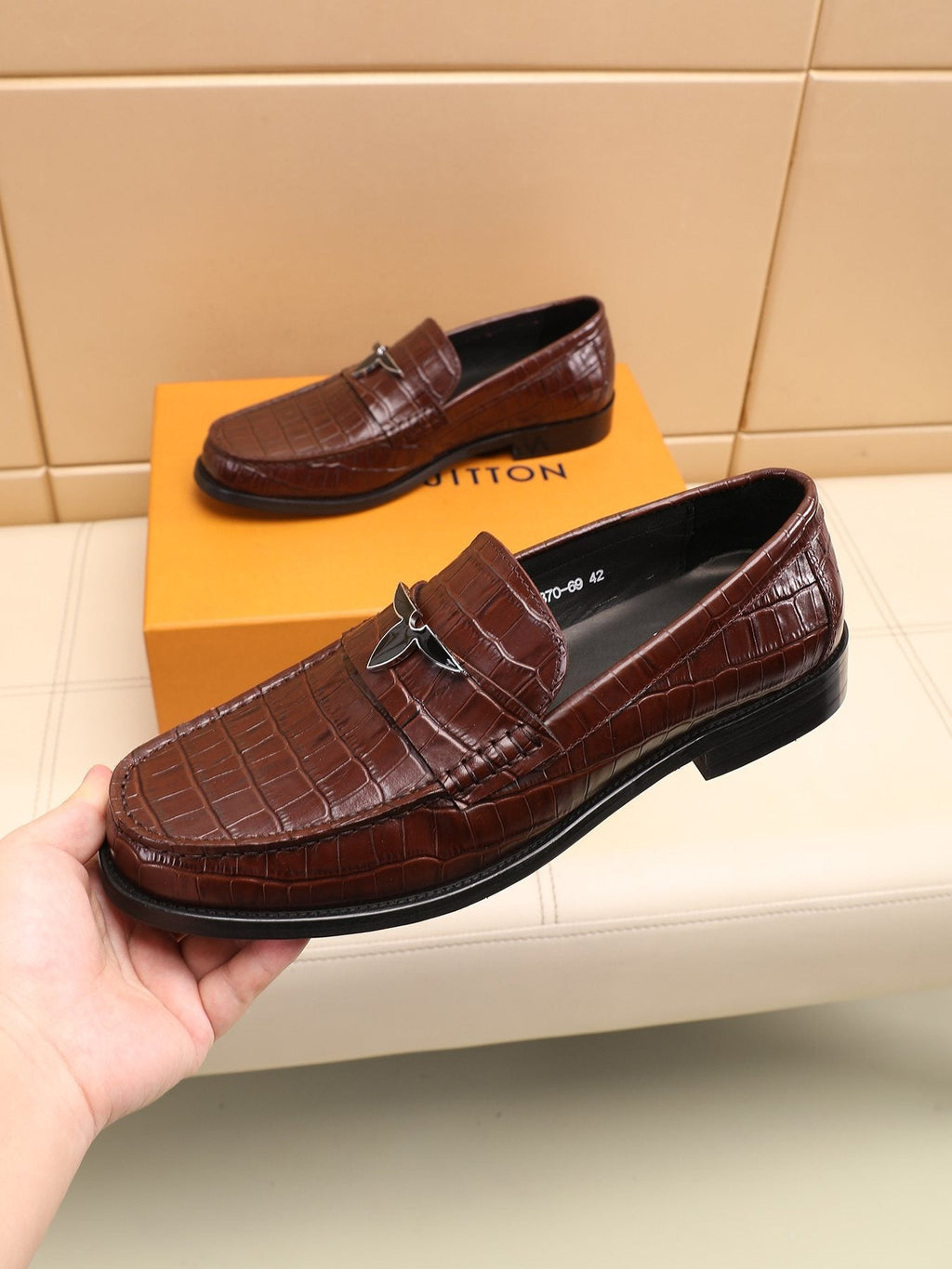 Louis Vuitton Embossed Strap Loafers — model